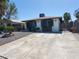 Well-maintained exterior with a spacious concrete driveway and simple landscaping features at 4509 Bingham Ave, Las Vegas, NV 89110