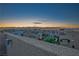 Residential neighborhood features lovely sunset views from the rooftop patio at 51 Morning Mimosa Ct, Henderson, NV 89012