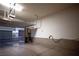 Clean two car garage features epoxy floors, side entry and garage door opener at 51 Morning Mimosa Ct, Henderson, NV 89012