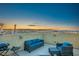 Enjoy outdoor living on this rooftop patio with comfortable seating and city views at 51 Morning Mimosa Ct, Henderson, NV 89012