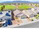 Aerial view of the home showing proximity to a school, landscaping, and a two-car garage at 5112 Foggia Ave, Las Vegas, NV 89130