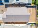 Aerial view of the home showing a large roof and minimal landscaping at 5112 Foggia Ave, Las Vegas, NV 89130