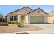 Charming single-story home featuring a two-car garage, low maintenance desert landscaping and neutral color palette at 5112 Foggia Ave, Las Vegas, NV 89130
