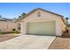 Charming single-story home featuring a two-car garage, low maintenance desert landscaping and neutral color palette at 5112 Foggia Ave, Las Vegas, NV 89130