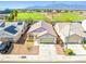 Aerial view of the home showing proximity to a school, landscaping, and a two-car garage at 5112 Foggia Ave, Las Vegas, NV 89130