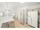 Spacious kitchen with white countertops and modern appliances open to dining area at 5112 Foggia Ave, Las Vegas, NV 89130