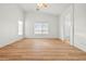 Spacious living room with wood flooring and natural light at 5112 Foggia Ave, Las Vegas, NV 89130