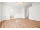 Spacious main bedroom with wood-look flooring and ensuite bathroom at 5112 Foggia Ave, Las Vegas, NV 89130