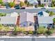 Aerial view of a single-story home featuring a low maintenance backyard with mature desert landscaping at 5112 Foggia Ave, Las Vegas, NV 89130