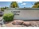 Canyon Willow community sign with desert landscaping and decorative rocks at 5196 Mandalay Springs Dr # 101, Las Vegas, NV 89120