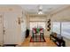 Inviting dining area filled with natural light, featuring a ceiling fan and space for a small table at 5196 Mandalay Springs Dr # 101, Las Vegas, NV 89120