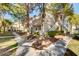 Charming community exterior boasting lush greenery and manicured landscaping at 5196 Mandalay Springs Dr # 101, Las Vegas, NV 89120