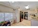Bright kitchen with wood floors and granite countertops offers great natural lighting at 5196 Mandalay Springs Dr # 101, Las Vegas, NV 89120