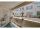 Private patio with greenery and tasteful decor, providing a serene outdoor living space at 5196 Mandalay Springs Dr # 101, Las Vegas, NV 89120
