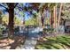Community pool area nestled amongst mature trees, offering a relaxing amenity at 5196 Mandalay Springs Dr # 101, Las Vegas, NV 89120