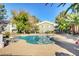 Community pool offers a refreshing escape with ample space for relaxation and leisure at 5196 Mandalay Springs Dr # 101, Las Vegas, NV 89120