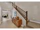 Spacious entryway with a stairway and a decorative cabinet at 5542 Oak Bend Dr, Las Vegas, NV 89135