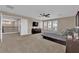 Spacious main bedroom with a ceiling fan and a view of the loft at 5542 Oak Bend Dr, Las Vegas, NV 89135