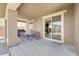 Spacious covered patio with dining area, perfect for outdoor gatherings and relaxation at 5542 Oak Bend Dr, Las Vegas, NV 89135