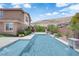 Backyard oasis with a modern rectangular pool, desert views, and lush landscaping at 5542 Oak Bend Dr, Las Vegas, NV 89135