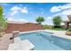 Modern pool design includes small waterfalls and clean lines with a stone-like base at 5542 Oak Bend Dr, Las Vegas, NV 89135