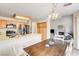Spacious eat-in kitchen and breakfast bar, seamlessly connected to a comfortable living area at 6058 Grape Blossom Ave, Las Vegas, NV 89142