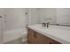 Bathroom featuring modern fixtures, bathtub, and ample counter space at 6075 Dapple Gray Rd, Las Vegas, NV 89149