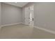 Bedroom with white walls and a light open door at 6075 Dapple Gray Rd, Las Vegas, NV 89149