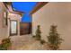 Exterior walkway with pavers and desert landscaping accents at 6075 Dapple Gray Rd, Las Vegas, NV 89149