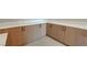 Kitchen cabinets with modern pulls and light stone countertops at 6075 Dapple Gray Rd, Las Vegas, NV 89149