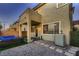 Cozy backyard features comfortable seating, low-maintenance landscaping, and convenient access to the home at 672 Solitude Point Ave, Henderson, NV 89012