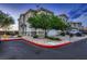 Charming two-story townhome with attached garage and landscaped front yard at 672 Solitude Point Ave, Henderson, NV 89012