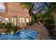 This backyard features a pool, spa, and patio for outdoor relaxation and entertaining at 7 Rue Promenade Way, Henderson, NV 89011