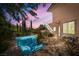 Beautiful pool, lounge chairs, and lush greenery create an inviting backyard oasis at 7 Rue Promenade Way, Henderson, NV 89011