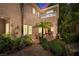 Lush backyard featuring a covered patio, mature landscaping and an outdoor grill at 7 Rue Promenade Way, Henderson, NV 89011