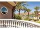 Balcony with lake view, lush foliage and scenic neighborhood views at 7 Rue Promenade Way, Henderson, NV 89011