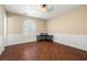 Bright bedroom features hardwood floors, window and custom molding at 7 Rue Promenade Way, Henderson, NV 89011