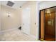 Home elevator offers convenience, with nearby door and neutral decor, ensuring easy access between floors at 7 Rue Promenade Way, Henderson, NV 89011