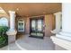 Elegant front entrance showcasing double doors, columns, and stone pavers at 7 Rue Promenade Way, Henderson, NV 89011