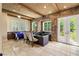 Game room with coffered ceiling, pool table, and wet bar for entertaining at 7 Rue Promenade Way, Henderson, NV 89011