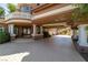 Elegant entrance featuring a porte-cochere with columns and detailed paving at 7 Rue Promenade Way, Henderson, NV 89011