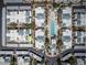 Bird's-eye view of the condo community, highlighting its layout and amenities like a pool at 7100 Pirates Cove Rd # 1099, Las Vegas, NV 89145