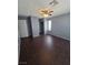 Bedroom featuring tile flooring, a ceiling fan, and closet at 7100 Pirates Cove Rd # 1099, Las Vegas, NV 89145