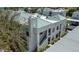 A modern apartment building with multi-level balconies, exterior stairs and landscaped grounds at 7100 Pirates Cove Rd # 1099, Las Vegas, NV 89145