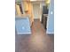 Kitchen with tiled floors, stainless steel appliances and a granite countertop bar area at 7100 Pirates Cove Rd # 1099, Las Vegas, NV 89145