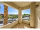 Relaxing covered balcony offering city views, perfect for outdoor seating and enjoying the scenery at 7127 S Durango Dr # 310, Las Vegas, NV 89113