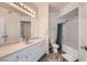 Bathroom featuring a shower-tub combo, toilet, and vanity at 7127 S Durango Dr # 310, Las Vegas, NV 89113