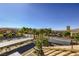 A serene view of the community featuring palm trees and clear blue sky at 7127 S Durango Dr # 310, Las Vegas, NV 89113