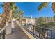 Exterior view showcasing the building's architectural details, pathway, and well-maintained landscape at 7127 S Durango Dr # 310, Las Vegas, NV 89113
