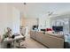 Inviting living room featuring a fireplace, study area, and ample space for relaxation and entertainment at 7127 S Durango Dr # 310, Las Vegas, NV 89113